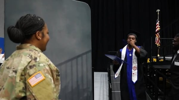 Deployed mom and her son have emotional reunion when she surprises him at West Georgia graduation