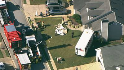 PHOTOS: FedEx truck plows into Gwinnett County home