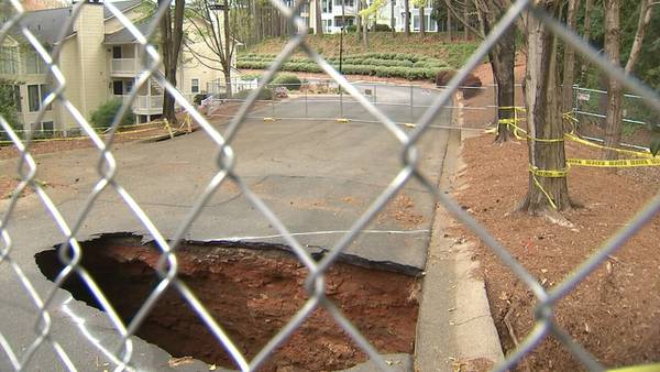 Growing sinkhole at metro Atlanta apartments has residents stuck with no way to leave