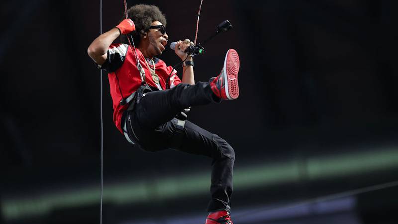 The rapper made an unusual entrance before the fourth quarter of Sunday's NFL game.