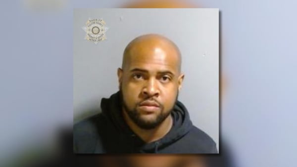 Hapeville officer arrested for violating oath, repeatedly using Taser on man in police custody
