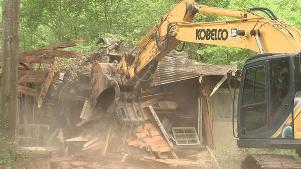 Blighted home so overgrown neighbors didn’t know it was there is torn down in DeKalb County