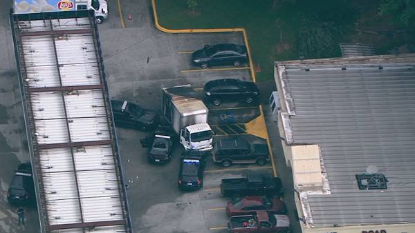 Police respond to officer-involved shooting in parking lot of Cobb County gas station