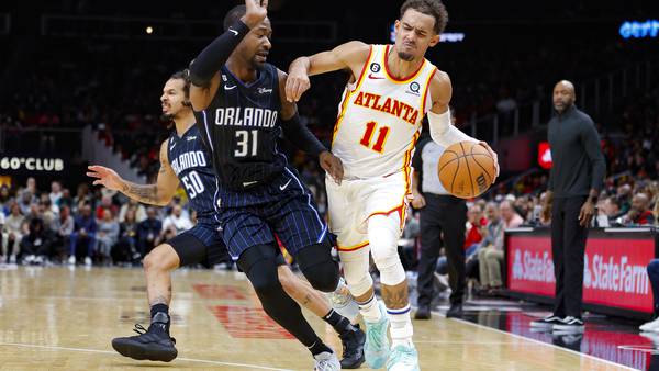 Young, Collins power Hawks past Magic 108-98