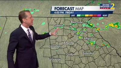 Warm, muggy and cloudy with a few showers overnight into Friday morning