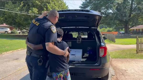 Hapeville officer presents teen with new PlayStation