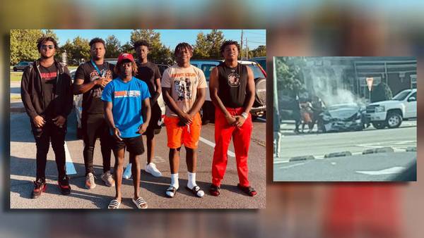 Rome football players jump into action to save woman involved in car wreck