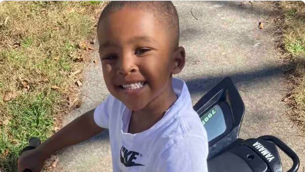 Candlelight vigil held for 6-year-old boy beaten to death 