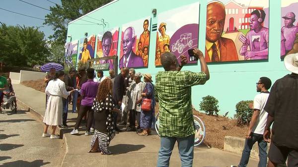 Atlanta community comes together to replace vandalized murals