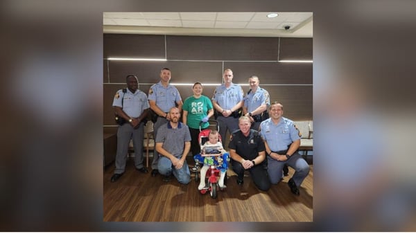 Troopers surround 3-year-old boy with love after rescuing him from fiery crash months ago