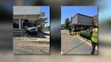 Workers trying to keep Burger King from collapsing after SUV plows into it