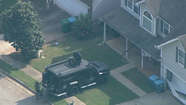 SWAT teams investigating home in Hampton