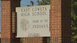 Child injures both legs after getting pinned between 2 cars at Coweta high school 