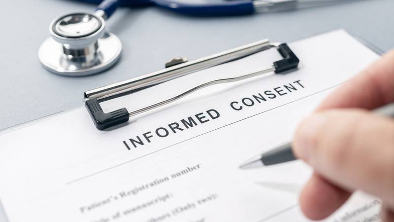 informed consent form being filled out