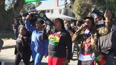 Activists hold impromptu march calling guilty verdicts in Arbery trial a historical victory