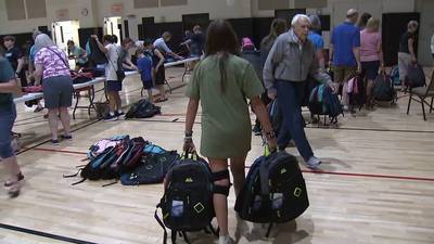 A Forsyth County church is giving more than 1000 backpacks filled with supplies to local schools