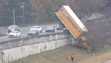 Truck falls over the side of busy Atlanta interstate