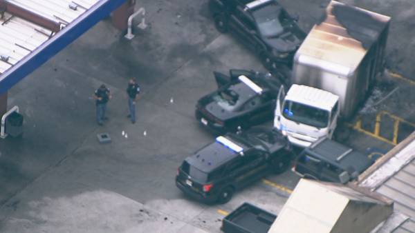 PHOTOS: Officer-involved shooting at Cobb County gas station
