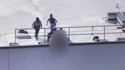 Video shows dramatic rescue of woman in crisis on top of Fulton courthouse
