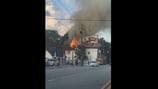 Crews battle blazing fire at historic building, across from where iconic Krispy Kreme burned down