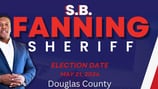 Douglas County sheriff candidate arrested on battery-family violence charge