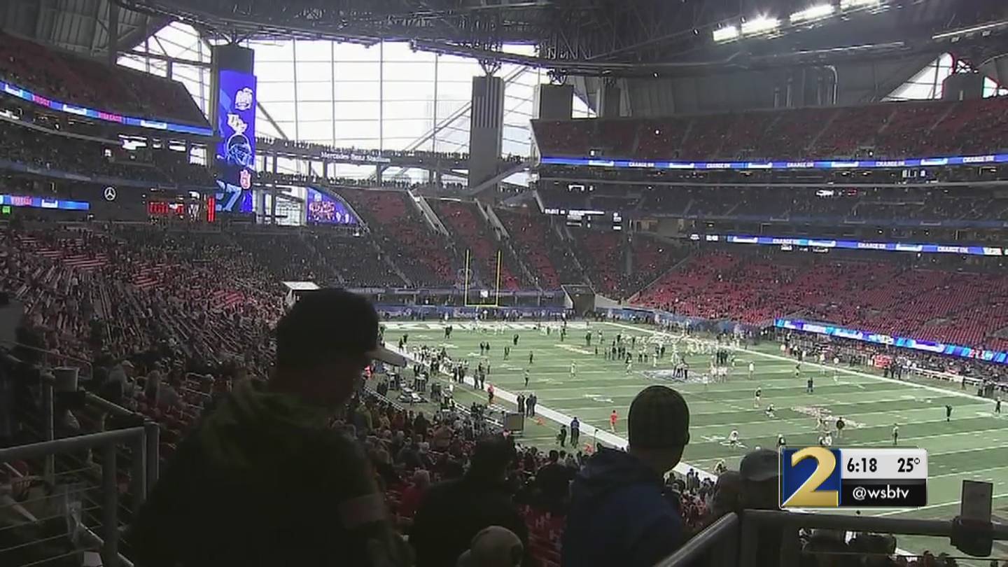 Fans brave the frigid elements for the ChickFilA Peach Bowl WSBTV