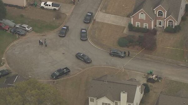 Police surround homes in DeKalb neighborhood after at least 1 shot, police say