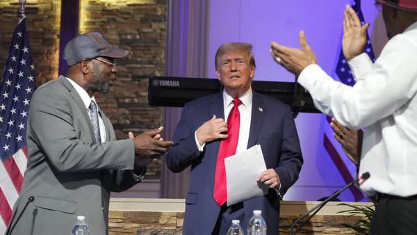 Trump blasts immigrants for taking jobs as he courts voters at a Black church, MAGA event in Detroit