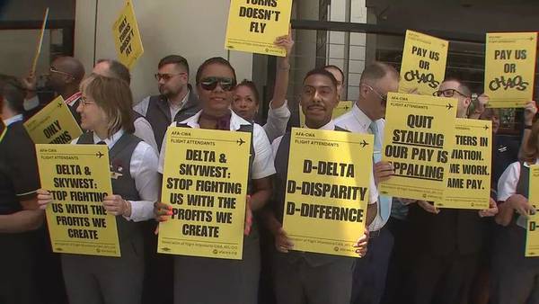 Flight attendants rally in Atlanta for better pay, benefits from Delta Airlines