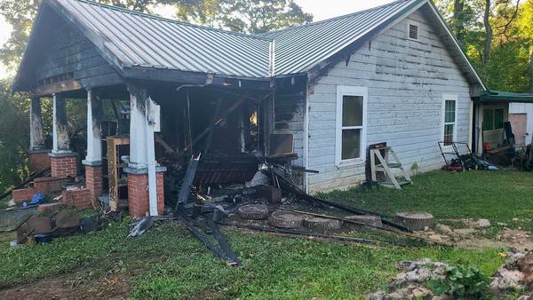 Cherokee house destroyed after passerby notices porch on fire