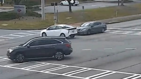 Gwinnett driver claims they had the yellow light. Surveillance video shows otherwise