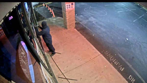 Video shows burglar breaking into Gwinnett restaurant without making any noise