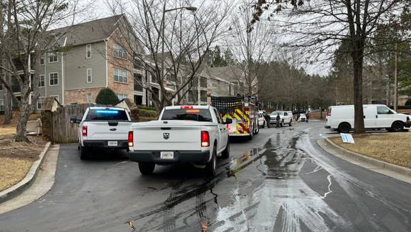 SWAT teams surround barricaded gunman at Norcross apartment complex