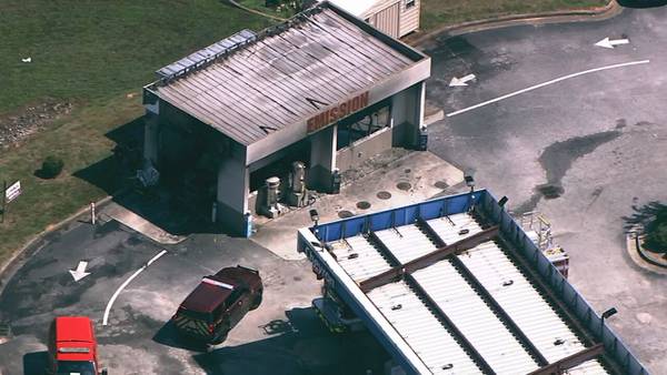 Fire crews investigating burned emissions testing building in Henry County
