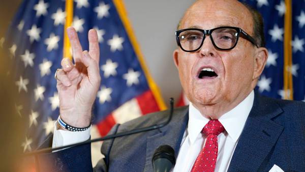 Travel records show Giuliani capable of appearing before grand jury
