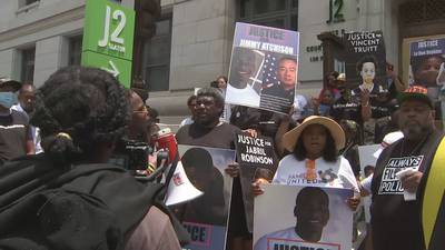Family members of people killed by police rally in front of Fulton DA’s office