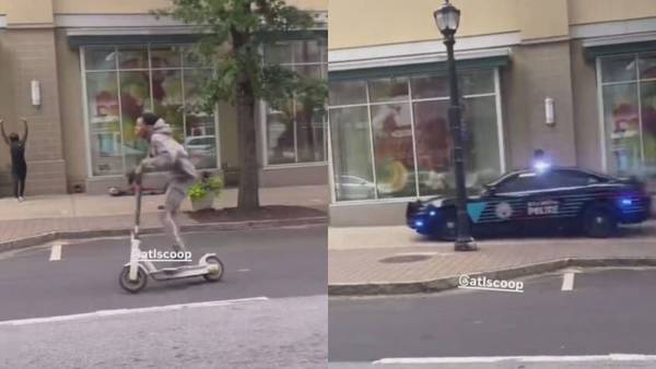 Video shows police cruiser chasing after wanted scooter rider down sidewalk