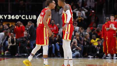 Murray, Young lead Hawks past pesky Rockets 117-107