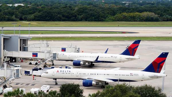 Passenger says man sneaked onto Delta flight in security breach at Atlanta’s airport