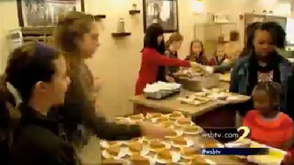 Army of volunteers help feed homeless Thanksgiving dinner