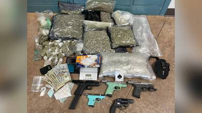 2 arrested with guns, pills, and large bags of marijuana in west GA