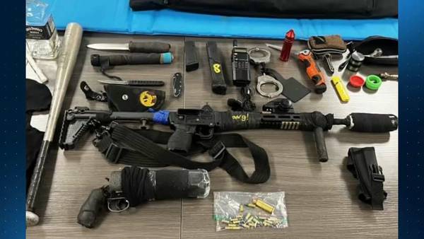 Man threatened dealership employee with gun, returned with arsenal of explosives, other weapons