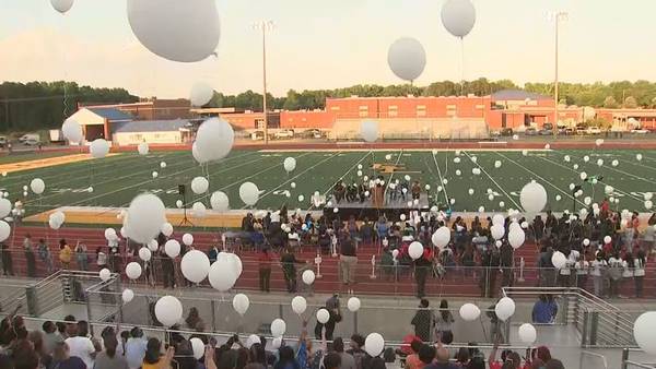 Vigil held for students at Eagle's Landing High School who died in car accidents