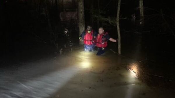 Construction workers trapped by rising flood waters while trying to clear Alpharetta sewer