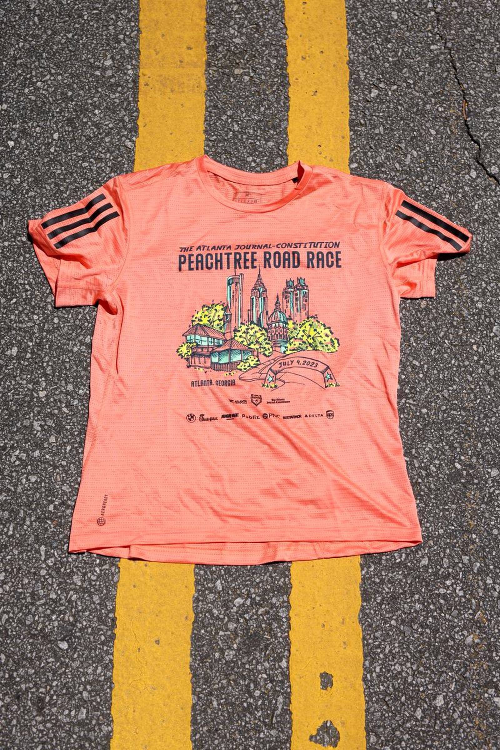 And the official 2023 AJC Peachtree Road Race Tshirt winning design is