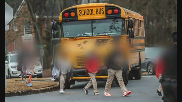 Child who slipped, fell in the street run over by school bus in DeKalb County, police say