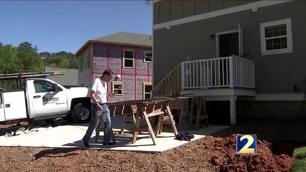 Clark Howard and Habitat for Humanity dedicated it's 100th Habitat house together