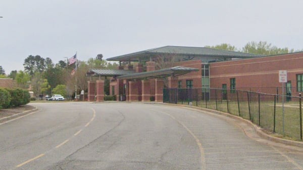Metro Atlanta student, 15-year-old caught with firearms, drugs in school parking lot, officials say
