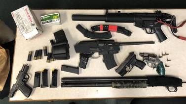 Traffic stop for broken headlight ends with arrests for stolen guns and more in middle GA