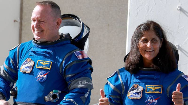 CAPE CANAVERAL, FLORIDA - JUNE 01:  NASA’s Boeing Crew Flight Test Commander Butch Wilmore (L) and Pilot Suni Williams walk out of the Operations and Checkout Building on June 01, 2024 in Cape Canaveral, Florida. The astronauts are heading to Boeing’s Starliner spacecraft, which sits atop a United Launch Alliance Atlas V rocket at Space Launch Complex 41 for NASA’s Boeing crew flight test to the International Space Station.  (Photo by Joe Raedle/Getty Images)